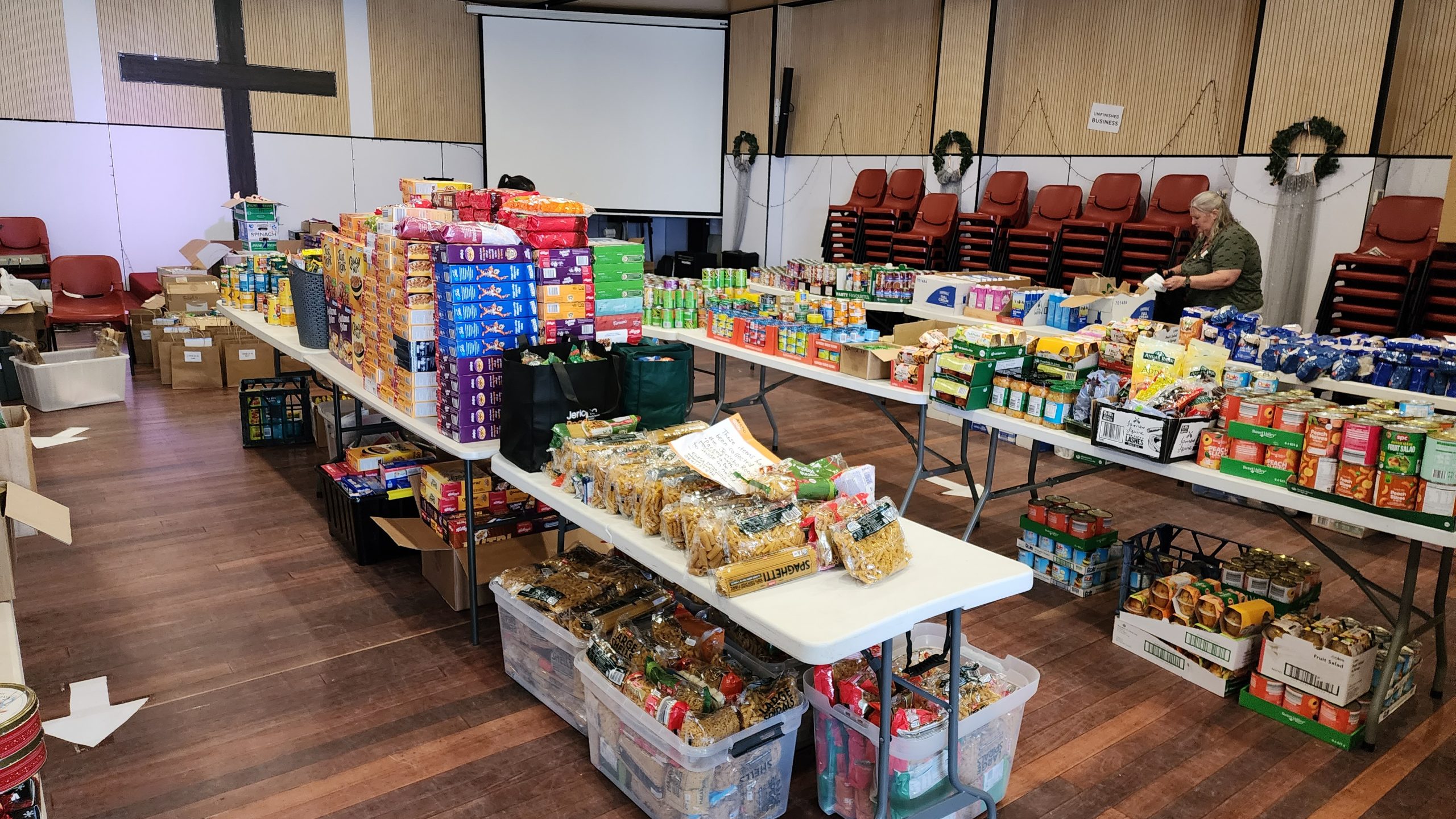 The food items come from all over the place - collected by churches over many weeks, or purchased by our team with the funds donated - laid out and ready to be packed.