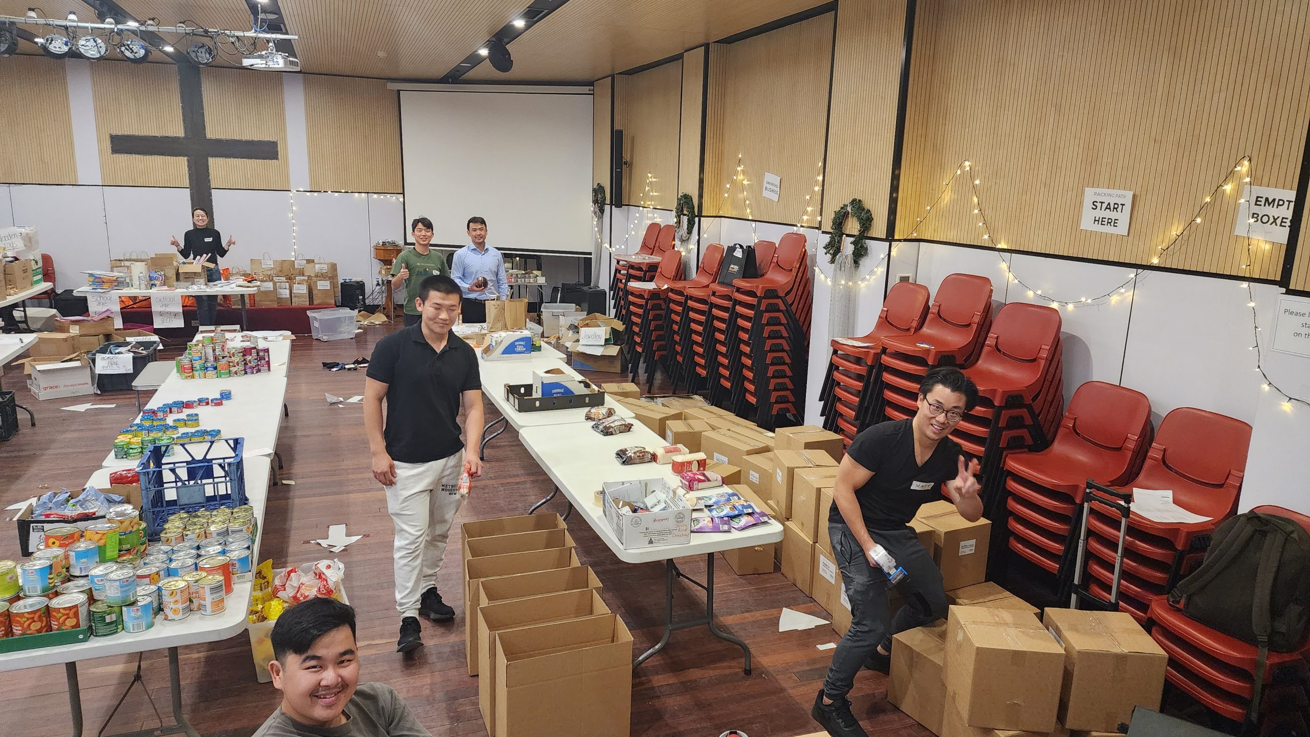 Volunteers from GracePoint Presbyterian Church and Sydney Living Hope Community Church - amazing effort for the Thursday evening shift, finishing up the last of the hampers a day early!