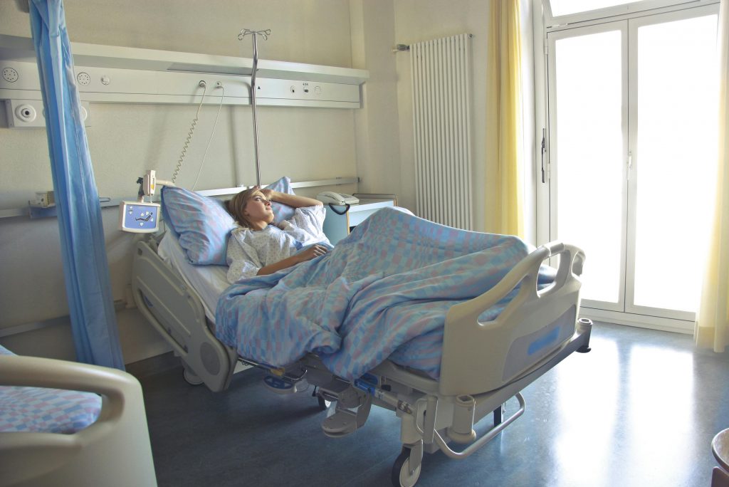 Women in hospital bed